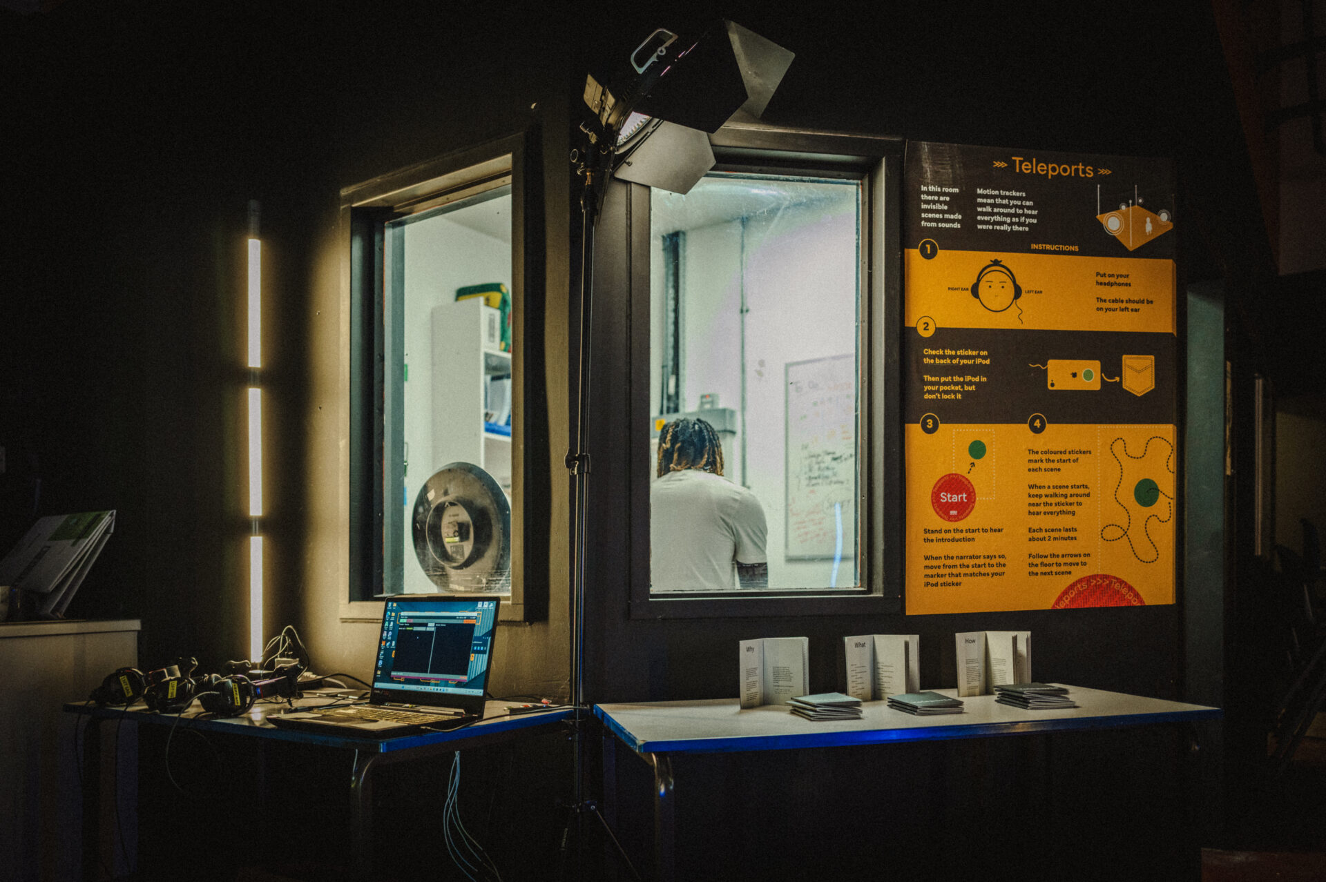 Workshop 5 with the Teleports installation - a how-to poster, the computer setup, and the booklets