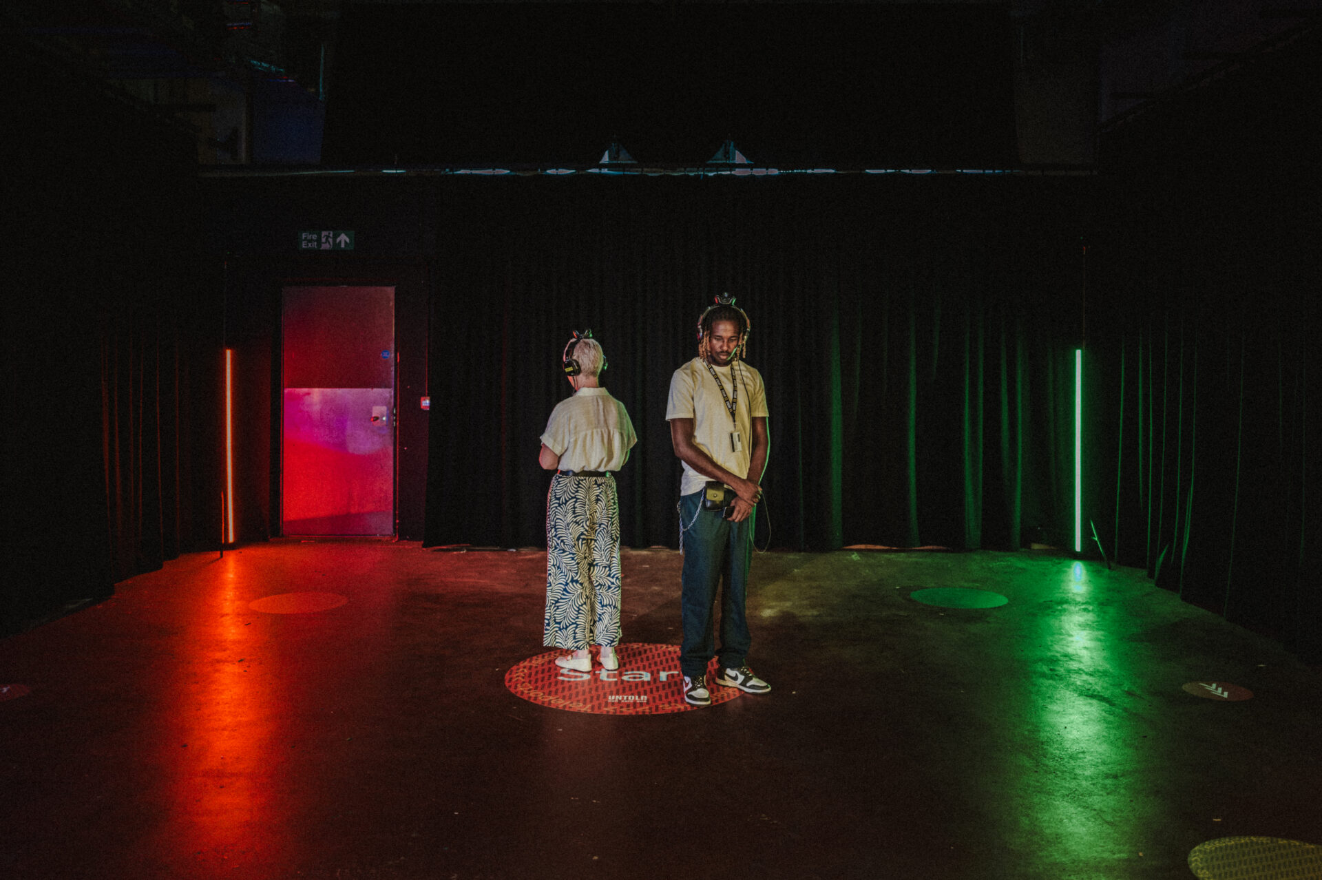 Workshop 5 with the Teleports installation - two visitors listening on the Start spot